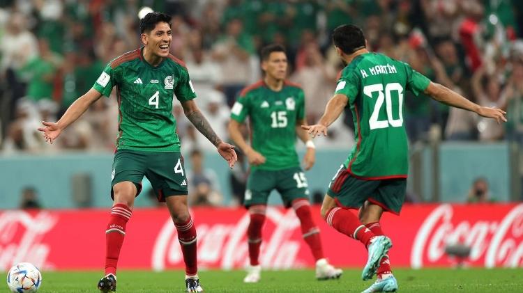 Henry Martín celebrates Mexico's first goal with Edson Álvarez during the game against Saudi Arabia - Patrick Smith - FIFA via Getty Images - Patrick Smith - FIFA via Getty Images