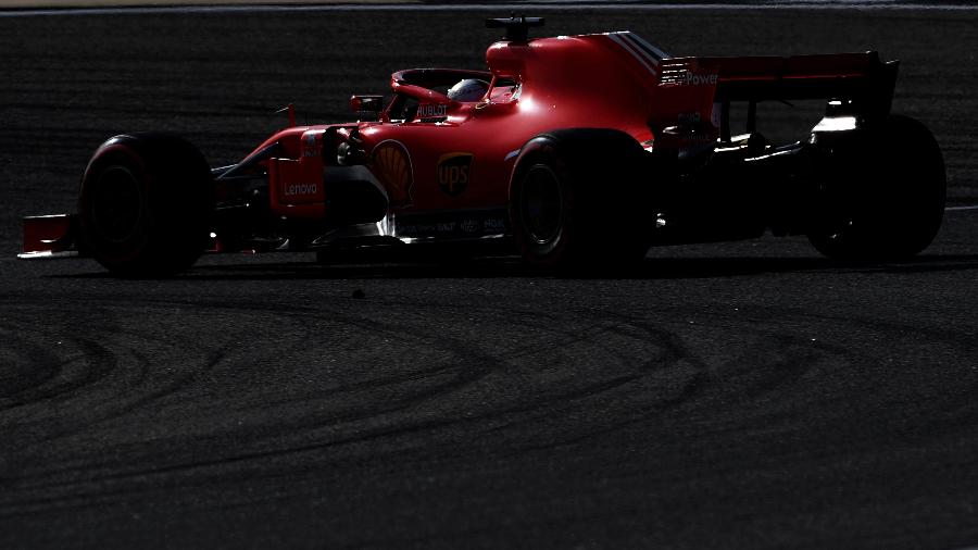 Sebastian Vettel, durante treino no Bahrein - AFP PHOTO / ANDREJ ISAKOVIC