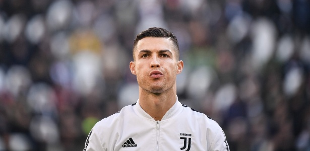 Cristiano Ronaldo prometeu colaborar com a Polícia dos Estados Unidos - Marco BERTORELLO / AFP