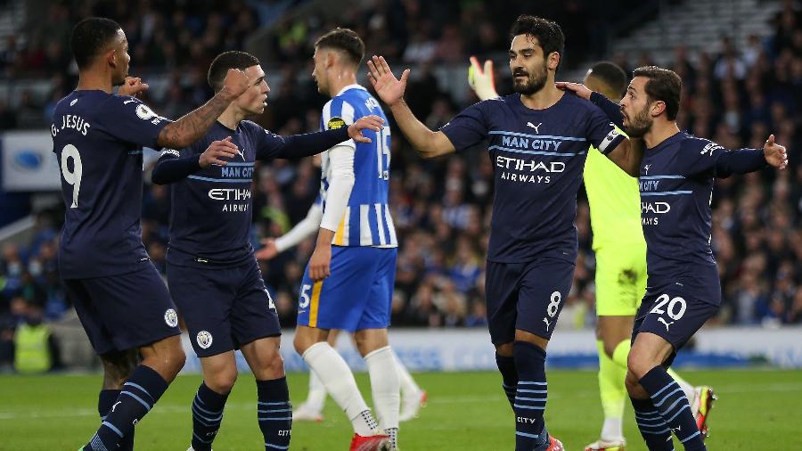 Jogadores do Manchester City comemoram gol marcado diante do Brighton em partida válida pelo 1º turno do Campeonato Inglês 2021/22 - Steve Bardens/Getty 