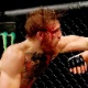 Conor McGregor acerta Chad Mendes e consegue o nocaute no segundo round, para faturar o cinturão interino dos penas do UFC - Josh Hedges/Zuffa LLC/UFC