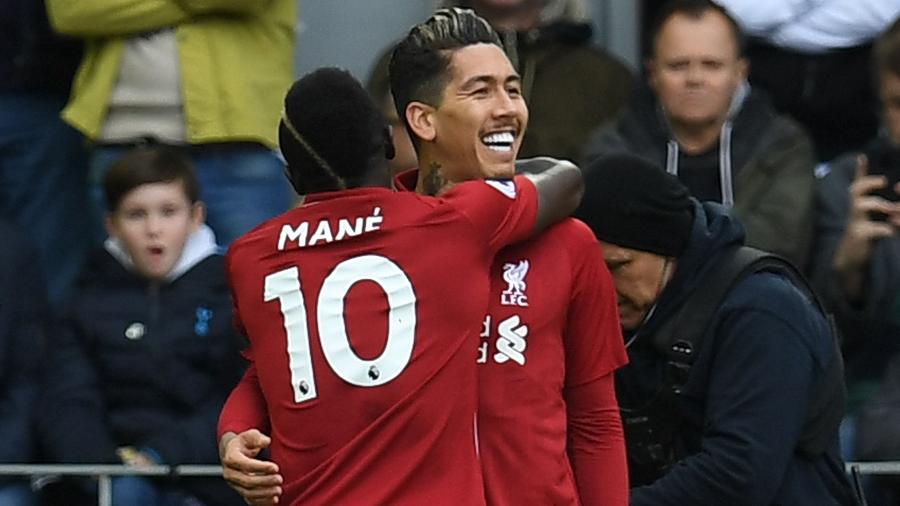 Firmino comemora gol do Liverpool contra o Tottenham - PAUL ELLIS/AFP