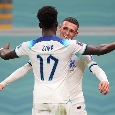 Saka e Phil Foden comemoram gol da Inglaterra sobre Senegal -  Marc Atkins/Getty Images