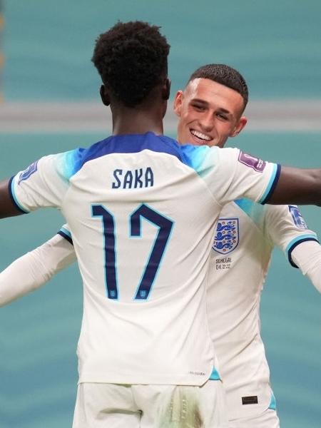 Saka e Phil Foden comemoram gol da Inglaterra sobre Senegal -  Marc Atkins/Getty Images
