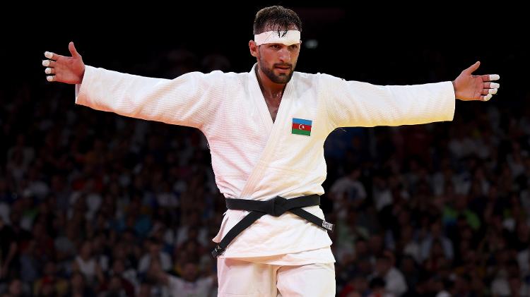 Zelym Kotsoiev comemora vitória na final no judô até 100kg nas Olimpíadas de Paris-2024