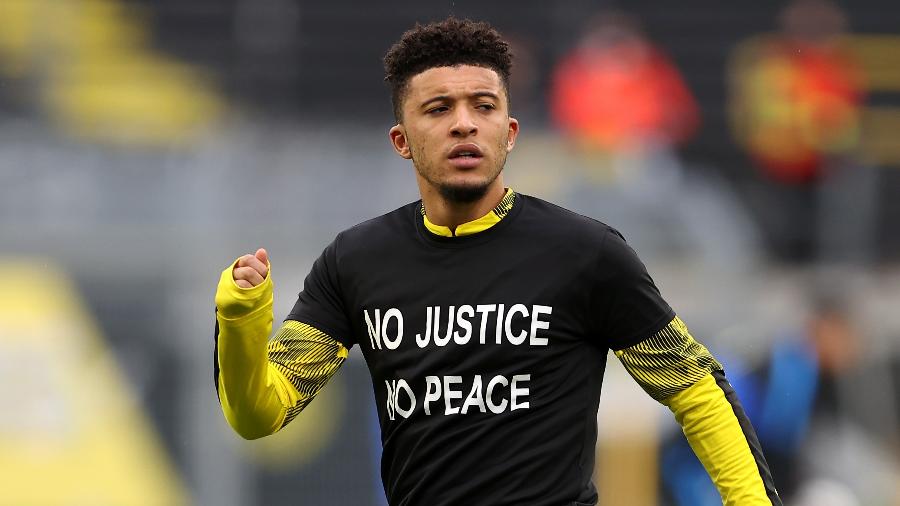 Jadon Sancho, do Borussia Dortmund, veste uma camiseta "Sem Justiça, Sem Paz" - Lars Baron/Getty Images