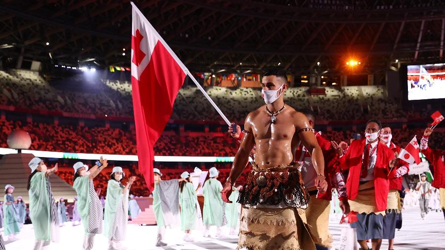 23.jul.2021 - Pita Taufatofua, o "besuntado de Tonga", sucesso na abertura da Rio 2016, volta a ser destaque em Tóquio. - Kai Pfaffenbach/Reuters