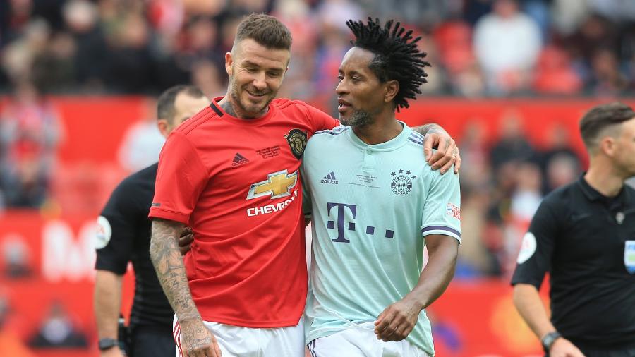 Beckham e Zé Roberto duelaram em amistoso entre Manchester United e Bayern de Munique em Old Trafford - Lindsey Parnaby/AFP