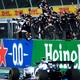 The entire AlphaTauri team celebrates Pierre Gasly's victory in the Italian Grand Prix - Rudy Carezzevoli / Getty Images