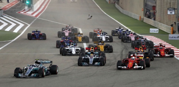 Vettel ultrapassou Hamilton na largada do GP do Bahrein - AFP PHOTO / Karim Sahib