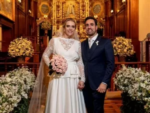 No altar, Adriana D'Urso e Sérgio Almeida