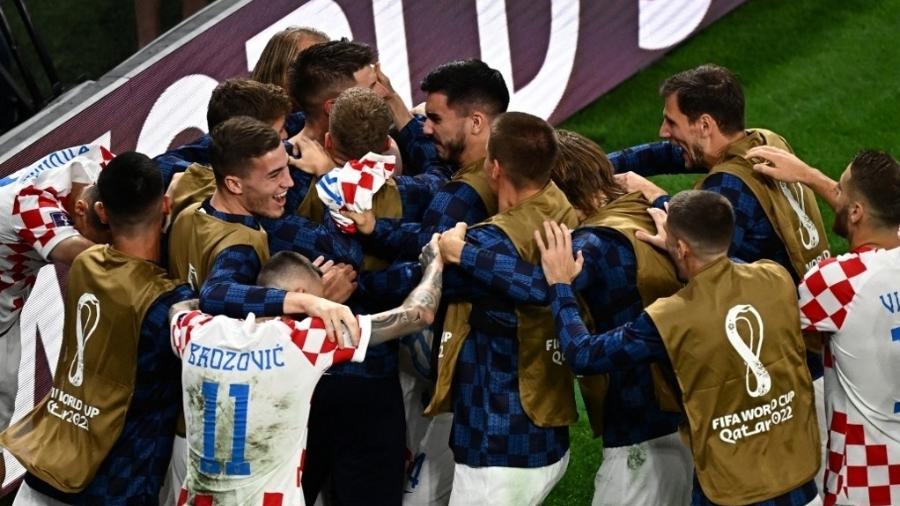 Seleção da Croácia celebra gol sobre o Brasil na Copa do Mundo - ANNE-CHRISTINE POUJOULAT / AFP