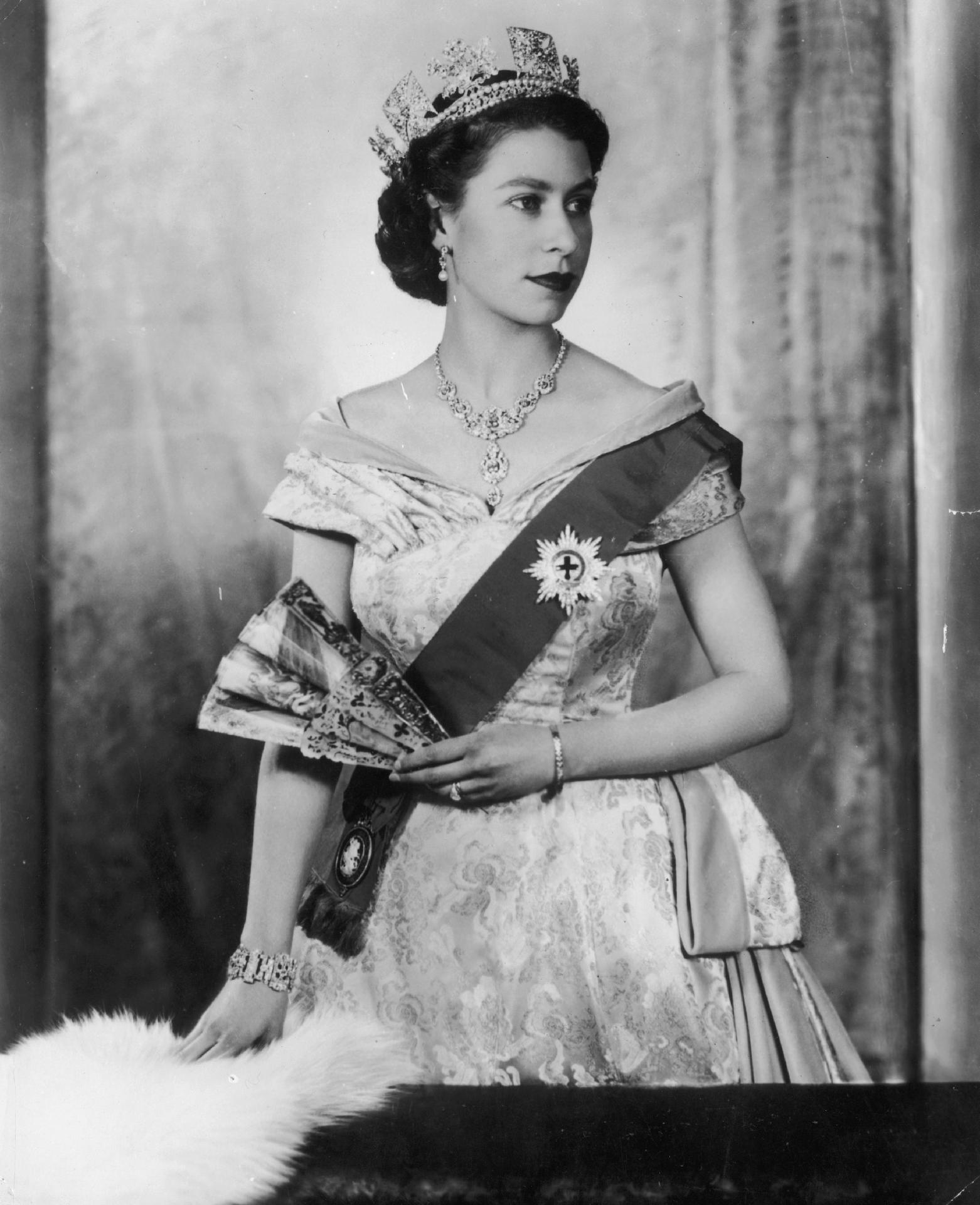 Queen Elizabeth II in a 1955 portrait - Getty Images