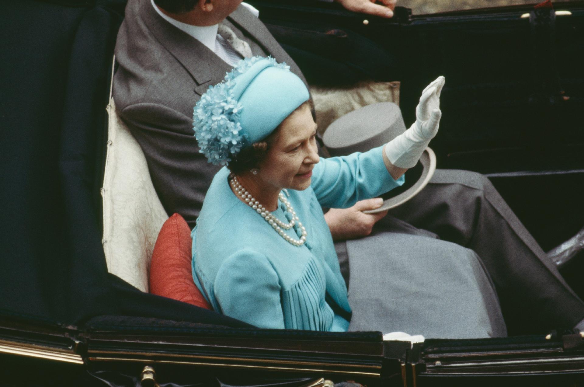 Queen Elizabeth II arrives at the wedding of Charles and Diana in July 1981 - Getty Images