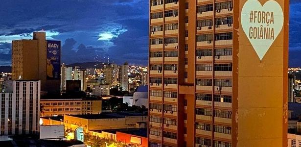 Esperança nos prédios de Goiânia | Quem é grupo que projeta mensagens de apoio e orientações sobre covid-19