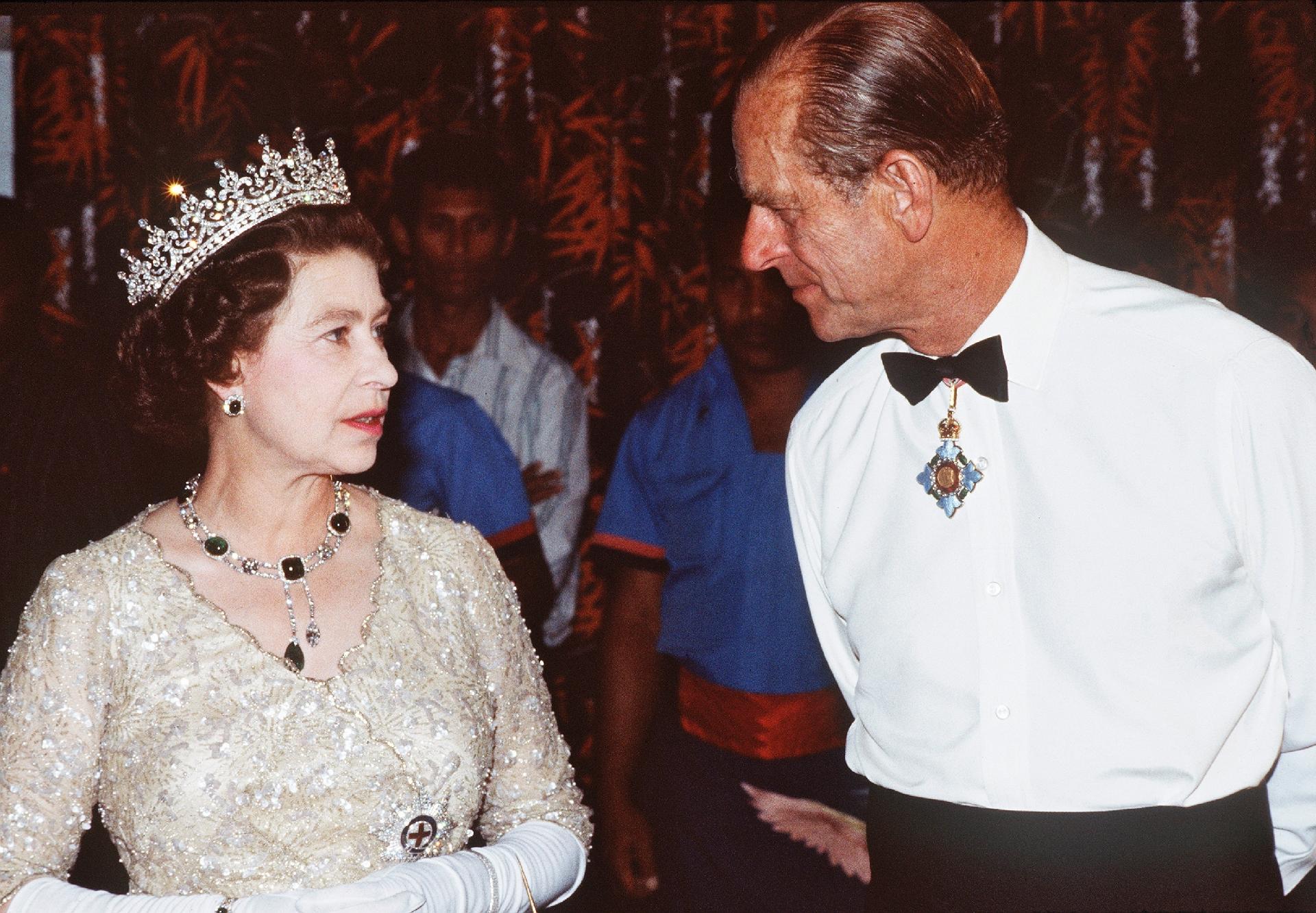 Queen Elizabeth II and Prince Philip at an exhibition in Papua New Guinea in October 1982 - Getty Images