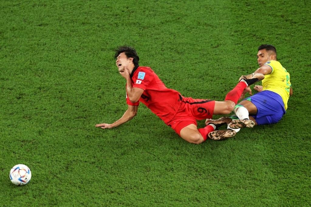 Guesung Cho of South Korea is hit by Casemiro during the World Cup Round of 16 match Alex Pantling/Getty Images