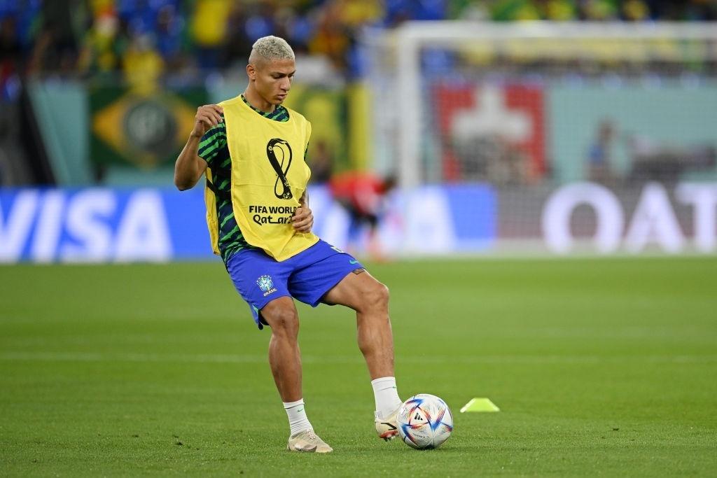 Richarlison, number 9 in Brazil, during a warm-up before the match against Switzerland - Matthias Hangst/Getty Images