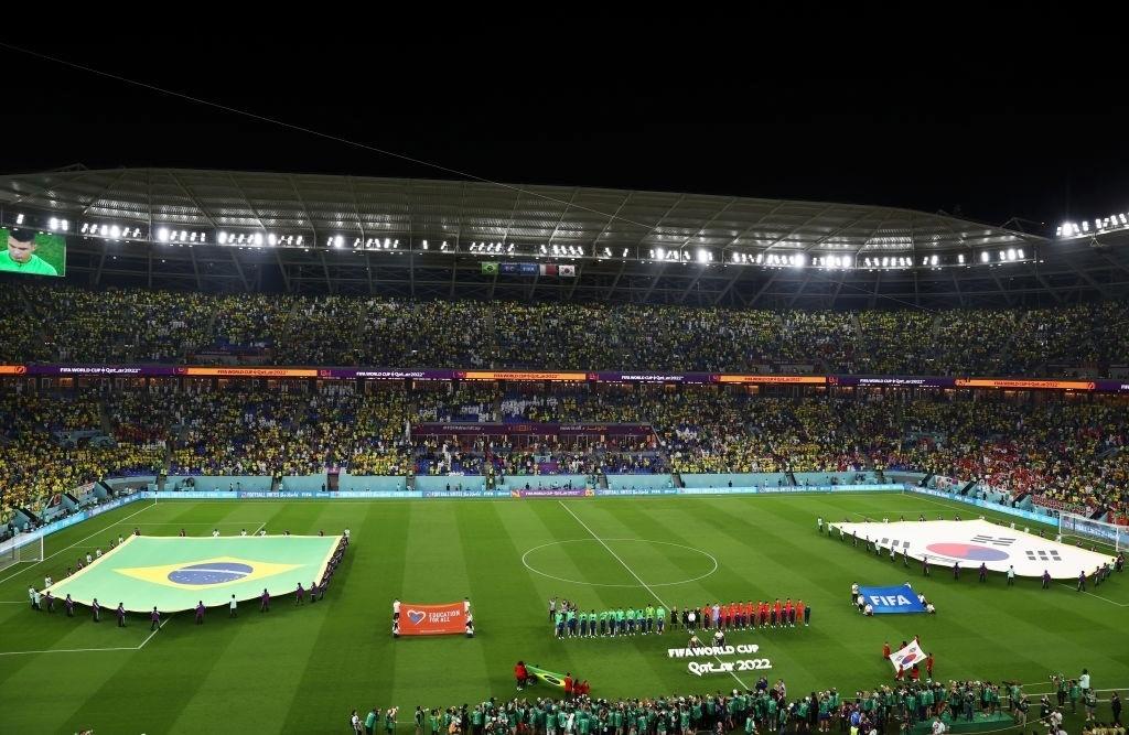 Players from Brazil and South Korea lined up for the anthems - Robert Cianflone/Getty Images