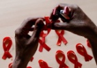 Manifestações pelo Dia Mundial de Luta Contra a Aids - Kiran Manjhunath/AFP
