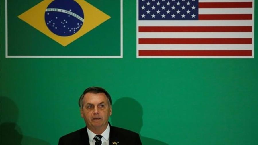 Nos EUA, Bolsonaro disse ainda que o "poder destruidor" so coronavírus estaria "superdimensionado" - MARCO BELLO/REUTERS via BBC