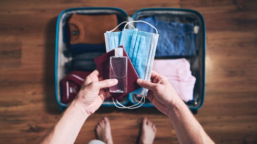 Passaporte, turismo na pandemia, turista, malas, viagem, viajar - Chalabala/iStock