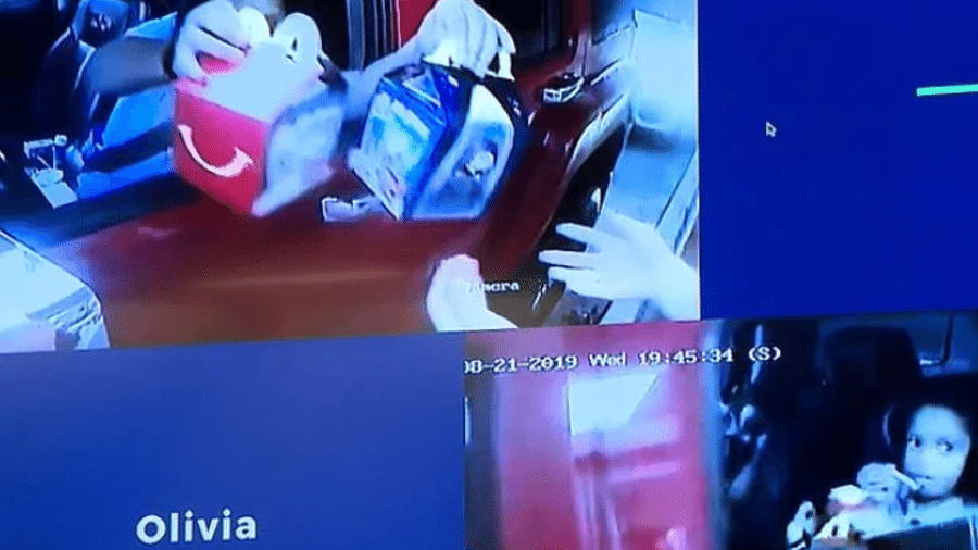 Imagens de câmeras de monitoramento mostram o momento em que a mãe de Olivia pega o pedido no drive-thru do McDonald's