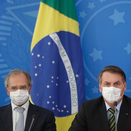 18.mar.2020 - O ministro da Economia, Paulo Guedes, e o presidente Jair Bolsonaro (sem partido) - Dida Sampaio/Estadão Conteúdo