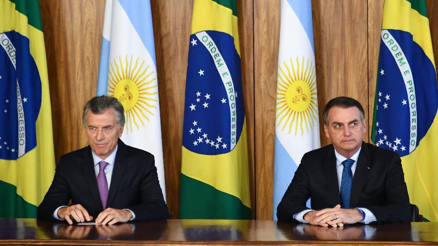 16.jan.2018 - Jair Bolsonaro e Mauricio Macri durante encontro em Brasília - Evaristo Sa/AFP