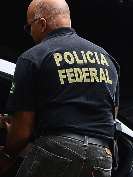 Agente da Polícia Federal em operação - Tânia Rego/Agência Brasil