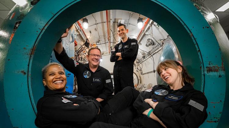 Sian Proctor, Chris Sembroski, Jared Isaacman and Hayley Arceneaux (left to right) in simulation inside Crew Dragon - Inspiration4/John Kraus - Inspiration4/John Kraus