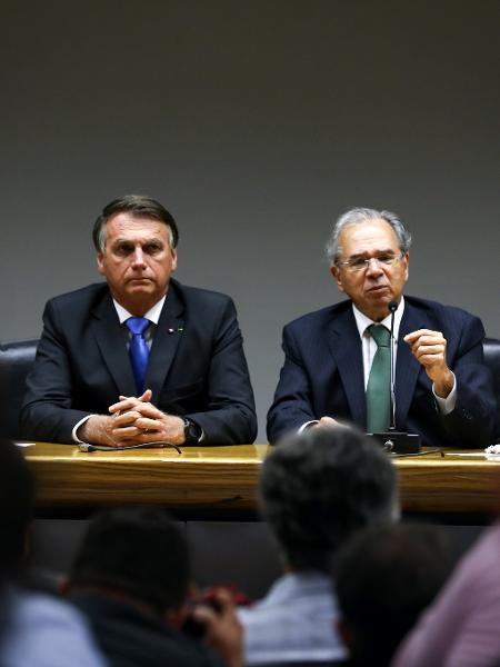 O presidente Jair Bolsonaro e o Ministro da Economia Paulo Guedes, durante declaração à imprensa - Clauber Cleber Caetano/PR