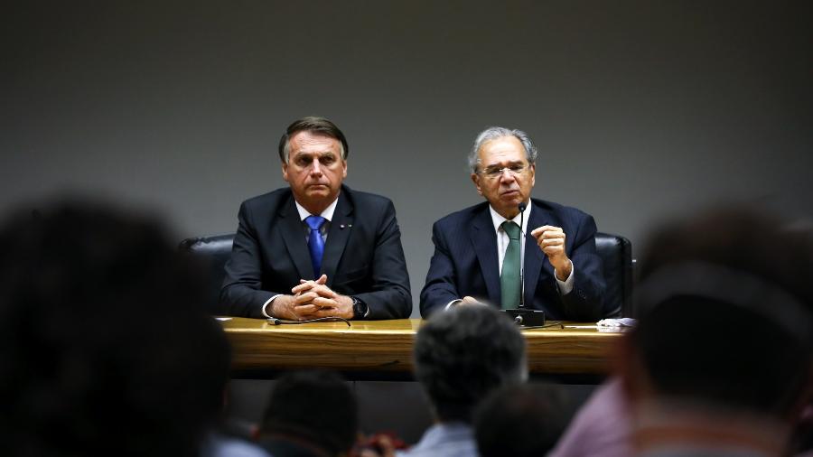 O presidente Jair Bolsonaro e o Ministro da Economia Paulo Guedes, durante coletiva de imprensa - Clauber Cleber Caetano/PR