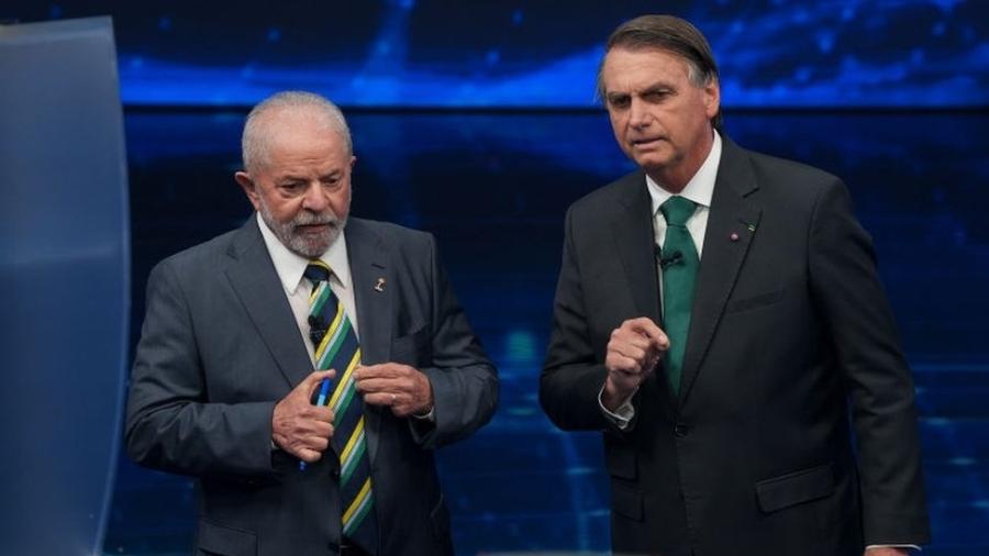 Os candidatos Luiz Inácio Lula da Silva (PT), que tem liderado a maioria das pesquisas eleitorais, e Jair Bolsonaro (PL), que está atrás nas intenções de voto, se enfrentam em um segundo turno presidencial histórico amanhã, dia 30 de outubro - Anadolu Agency/Getty Images