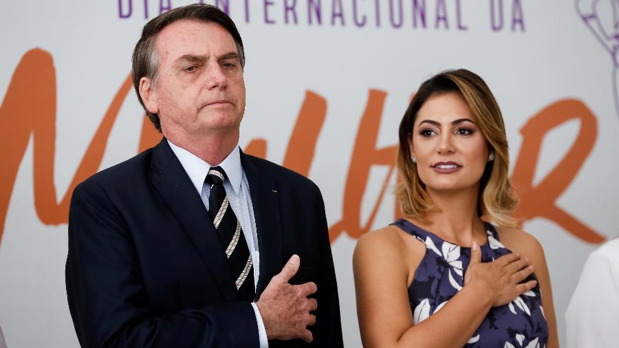 08.03.2019 - O presidente Jair Bolsonaro e a primeira-dama Michelle durante Dia Internacional da Mulher - Carolina Antunes/Presidência da República