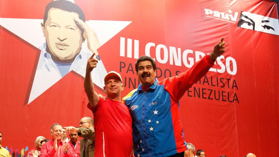 27.jul.2014 - Hugo Carvajal ao lado do presidente venezuelano, Nicolás Maduro - AFP