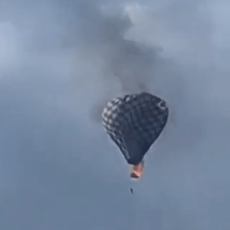 Vídeo publicado nas redes sociais mostram balão de ar em chamas com pessoa pendurada Vídeo publicado nas redes sociais mostram balão de ar em chamas com pessoa pendurada