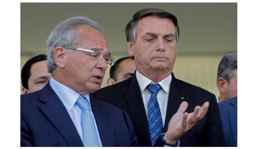 Paulo Guedes tenta ensinar Bolsonaro a contar até cinco. Vem nesse esforço desde que era apenas o Professor Raimundo do candidato impossível - Sérgio Lima/AFP