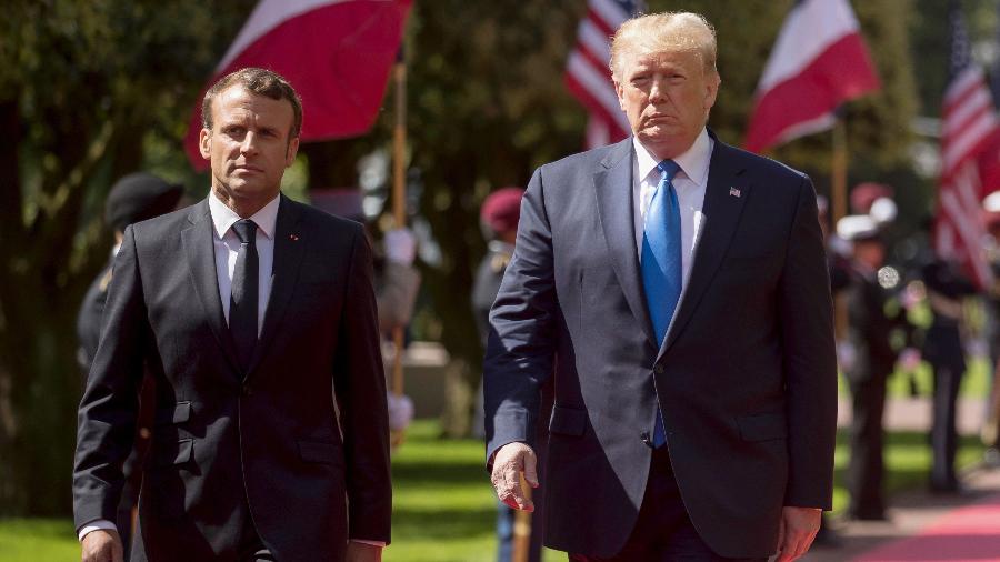 Presidente da França Emmanuel Macron e o presidente dos Estados Unidos Donald Trump na cerimônia de comemoração ao aos 75 anos do Dia D na Normandia - Ian Langsdon/Pool/AFP