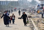 Palestinos encontram apenas ruínas ao retornar para suas casas em Gaza - Eyad Baba/AFP