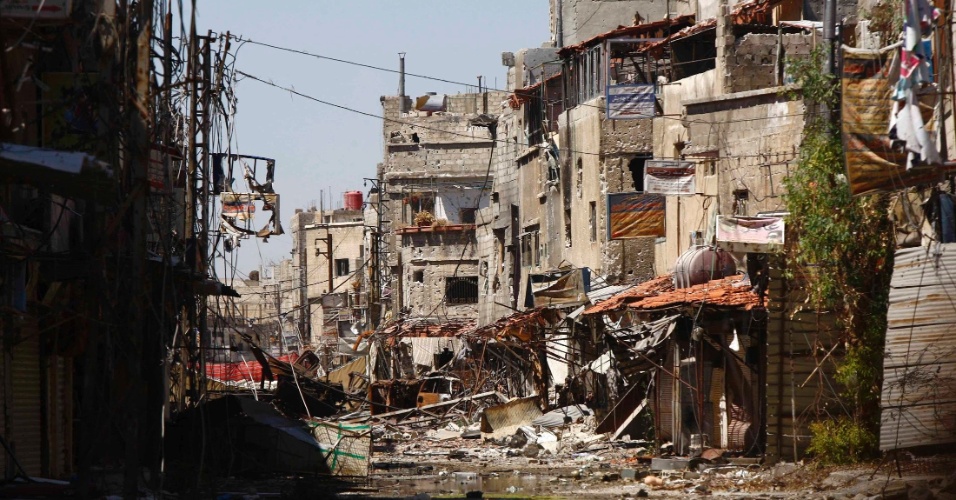 29.mai.2013 - Imagem divulgada nesta quarta-feira (29), mostra edifícios da região de Sayeda Zainab, em Damasco, destruídos durante confrontos entre o Exército de Libertação sírio e as forças leais ao presidente da Síria, Bashar al-Assad, na segunda-feira (27)