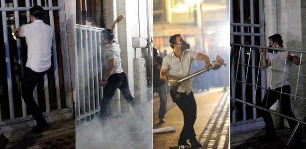 Homem quebra vidros da sede da Prefeitura de São Paulo usando cerca de proteção durante protestos - Gabriela Biló e Marcos Bizzotto/Futura Press