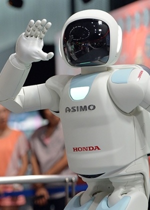  Asimo, robô humanoide da Honda - AP/Shizuo Kambayashi e AFP/Yoshikazu Tsuno