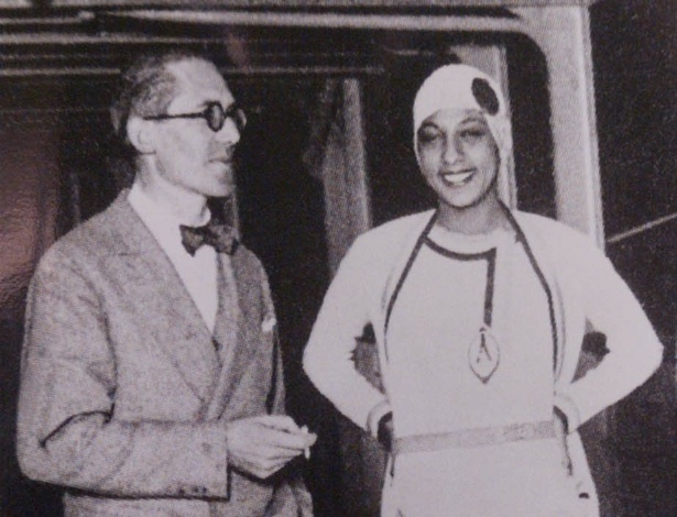 JOSEPHINE BAKER - Durante cinco décadas ela teve uma bem-sucedida carreira como cantora e dançarina. Mas durante a Segunda Guerra Mundial, além de entreter e encantar a audiência, trabalhou como espiã para a resistência francesa contra a ocupação nazista. Na imagem, o arquiteto francês Le Corbusier e a dançarina norte-americana Josephine Baker estão a bordo do navio a vapor Massilia, em viagem para o Brasil, em 1929. - Reprodução