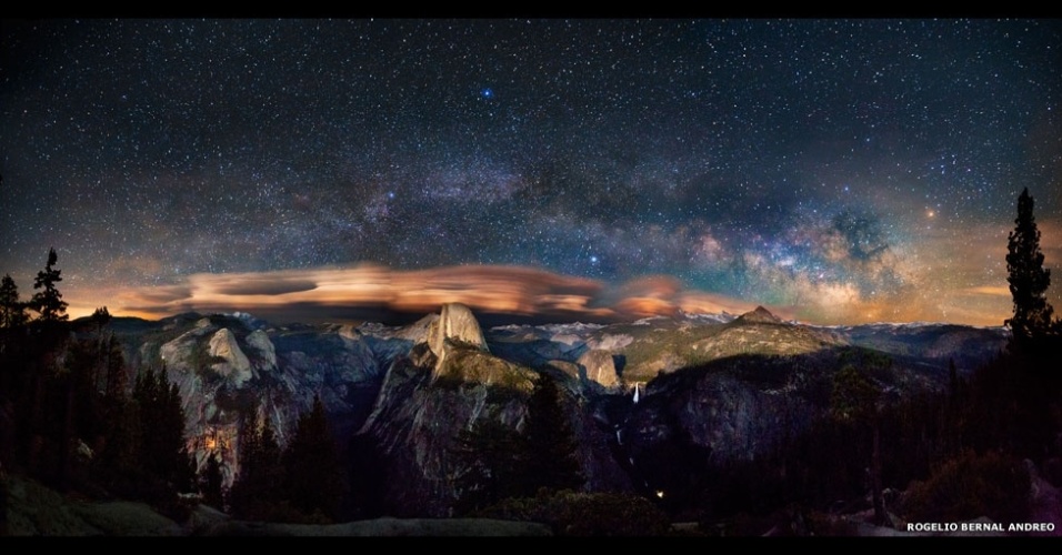 31.jul.2013 - O Observatório Real britânico de Greenwich, em Londres, anunciou os selecionados para competir ao título de "Fotógrafo de Astronomia de 2013". Acima, a imagem de Rogelio Bernal Andreo mostra galáxias rodopiando no espaço e a Via Láctea nos céus do Parque Nacional de Yosemite