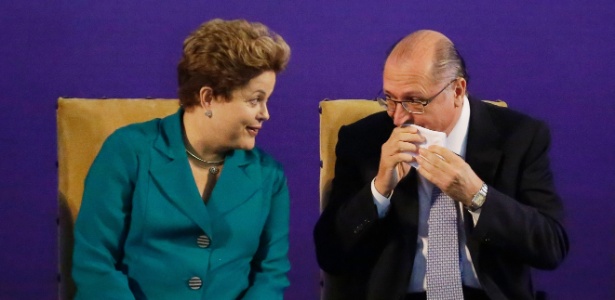 A presidente Dilma Rousseff (PT) e o governador Geraldo Alckmin (PSDB) anunciam investimentos em ligação de trem até Cumbica - Nelson Antoine/Fotoarena/Estadão Conteúdo