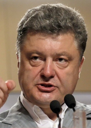 26.mai.2014 - O candidato à presidência da Ucrânia, Petro Poroshenko, concede entrevista coletiva em Kiev após reivindicar vitórias nas urnas - Sergei Supinsky/AFP