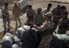 Conflito no Iraque: Ataques de grupo radical islâmico reacende o perigo da guerra civil - Khalil al-A