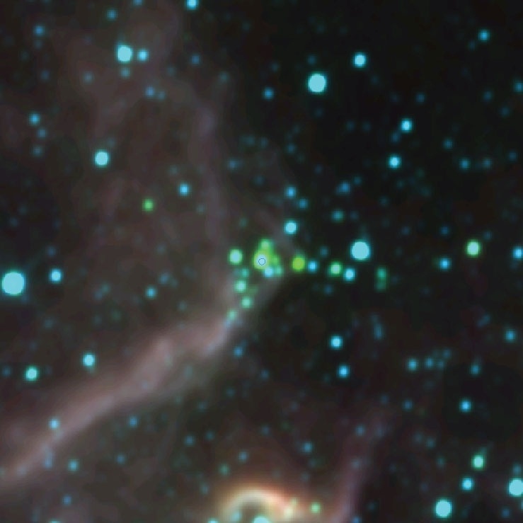 16.jul.2014 - Segundo Denilso Camargo, um dos autores, os aglomerados estelares se formam após o colapso gravitacional de condensações de gás e poeira no interior de nuvens moleculares gigantes. Essas condensações têm núcleos densos e ao colapsarem formam estrelas, que nascem em aglomerados. Na imagem, um dos aglomerados descobertos pelos pesquisadores da UFRS (Universidade Federal do Rio Grande do Sul) com os dados obtidos pelo telescópio Wise, da Nasa (agência espacial americana)