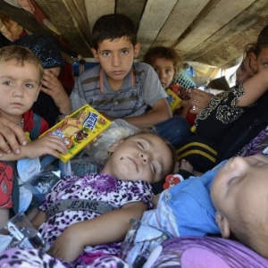 Refugiados iraquianos que fugiram da violência de jihadistras - Reuters